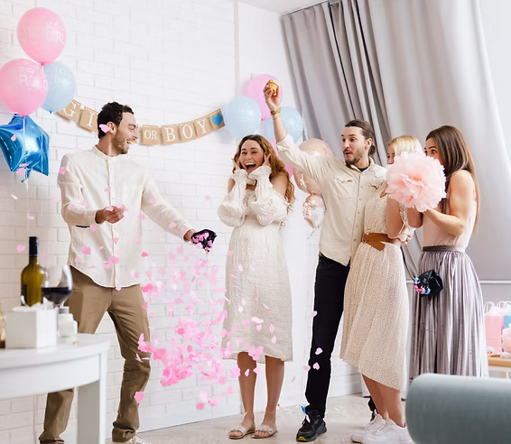 Happy family at gender reveal ultrasound session